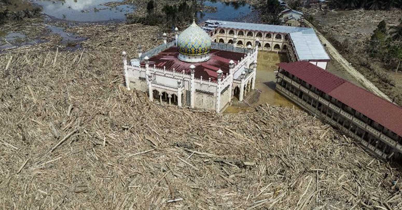 Nowhere To Pray As Logs Choke Flood-Hit Indonesian Mosque