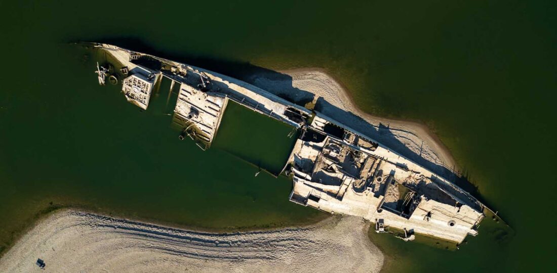 A Historic Boat Emerges In Serbia As Europe’s Rivers Run Dry From Drought And Heat
